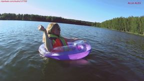 Alla swims in an inflatable ring on the lake!!!