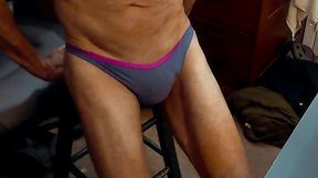 stretching on stool in wife s tiny grey thong with pink trim