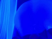Showing feet in blacklight