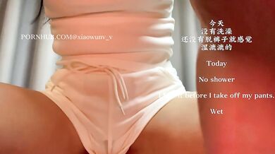 Masturbating with a vibrator at home, secretions flowing down the vagina