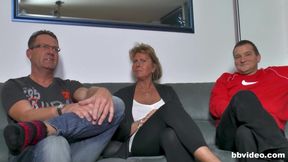 Mature woman fucks two guys