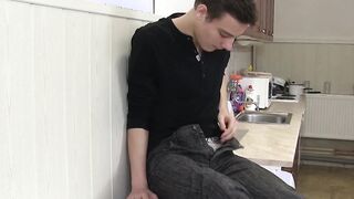 Young man on washing machine masturbates and plays with feet