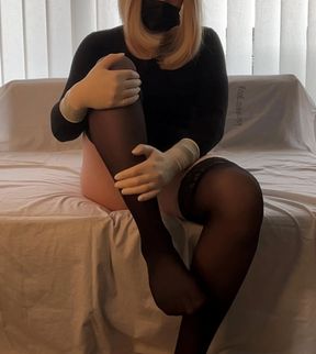 Young Femboy Nurse plays with surgical latex gloves