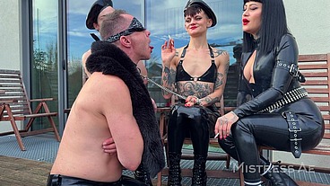 Smoking on the Patio - MistressAe and Friends Share Their Human Ashtray