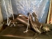 Chained masked wetsuited Orca struggles to jerk off