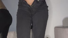 Omorashi girl desperately pisses her dark jeans soaking