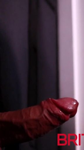 Redhead nurse sucks cock at a gloryhole