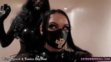 Heavy Rubberdoll Jessica und Latexwoman Kitty walking in the hotel floor