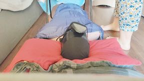 Foot smothering from chair (Front view)