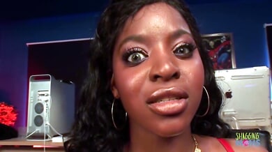 Dark-haired ebony woman in red lingerie takes big cock in interracial creampie