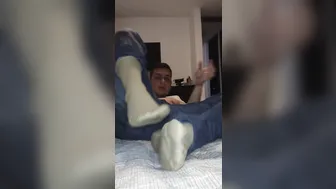 Twink gives handjob after work with socks and feet play