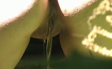 Juicy amateur blonde girl pisses in the woods outdoors