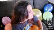 Metal girl pop all balloons before party - Bunny Looner