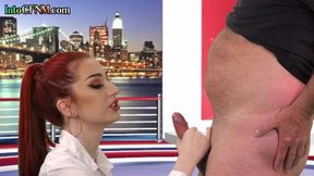 CFNM redhead British babe sucking prick in live TV show