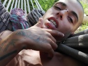 On the hammock. I lick my hairy armpits and play whit my asshole.