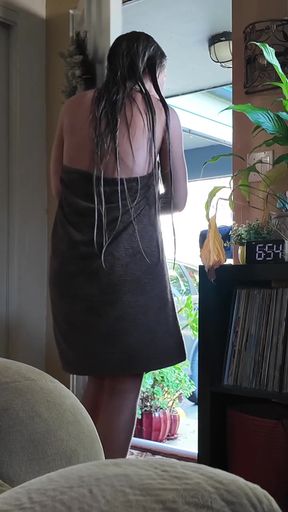 Woman looking out window