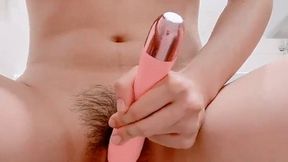 Asian girl masturbates and salivates with a vibrator