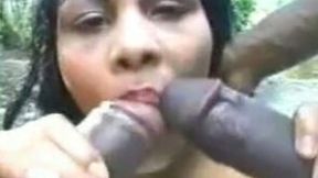 Incredible and sexy dark skin beauty outdoors sucking two BBC