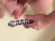 Foreskin docking/stroking using glass dildo then cum on dildo & suck clean.