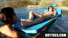 Stud has his nice toes sucked on in the pool