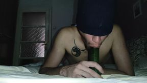 Deep sucking a huge cucumber