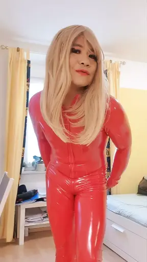 The Little Sissy in Red Catsuit