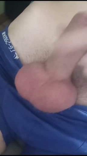 A handsome guy in blue underpants jerks off his juicy cock and ends up with hot cum on himself   Clip 1