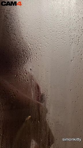 Check out this steamy shower scene with hot naked Simon
