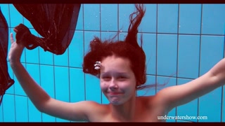 Petite Nata Szilva swimming naked