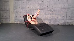 Kira tied with red ropes on the couch_Ordro