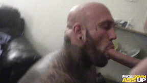 Inked bear facefucked