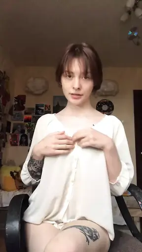 She took off her underwear on camera and showed a smooth pussy