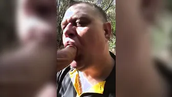 Muscular hunk gets his cock sucked on a sandy beach