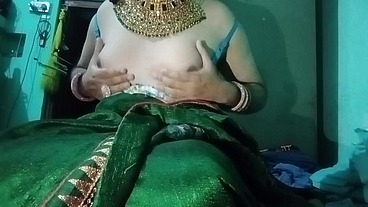 Indian trans woman Gaurisissy pressing his boobs so hard and enjoying in green Saree