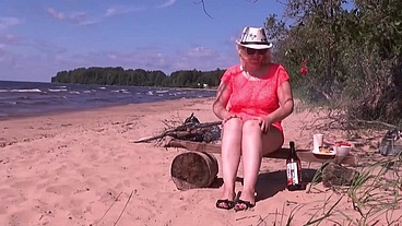 Naughty milf is having fun at a picnic - Sits pussy on a bottle of lemonade