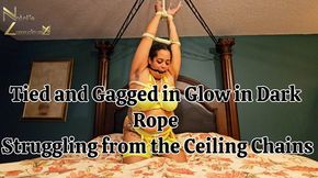 Tied & Gagged in Glow in the Dark Rope Bondage from Ceiling