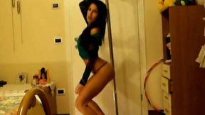 Sporty brunette in strings provides you with her pole dance