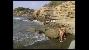 She Give a Nice Suck a Big Cock of His Friend While They Are in the Beach