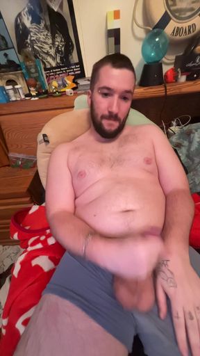 Chubby boy jerks off in bed