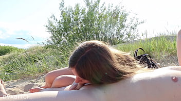 We were sunbathing at the dunes but I was so horny and couldn'_t resist to suck him off while no one is around
