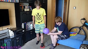 Blowing up balloons in thin, black socks with footjob