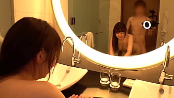 Sucking on her plump E-cup tits on a high floor with a view of the ocean, and fucking her superb pussy until the night is over!