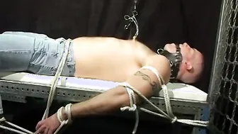 Muscular jock Bigg Pete gagged and bound with his nuts pulled