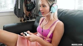 Teen Eliza Jane is playing video games while BF finger fucks her pussy