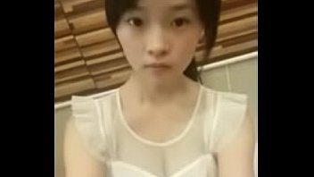 Cute chinese teen dancing on webcam