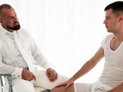 Innocent twink is seduced by suited DILF