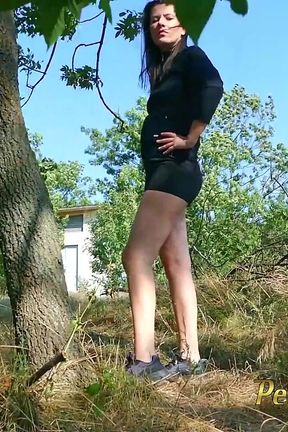 Outdoor pee standing in a small forest