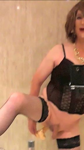 Crossdresser Fernanda Gomez Enjoying a Dildo in Front of the Mirror