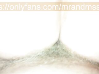 gal saddled the knob and rides on it close-up