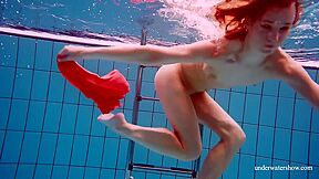 Cute Babe In Red Sexy Open Dress Swimming